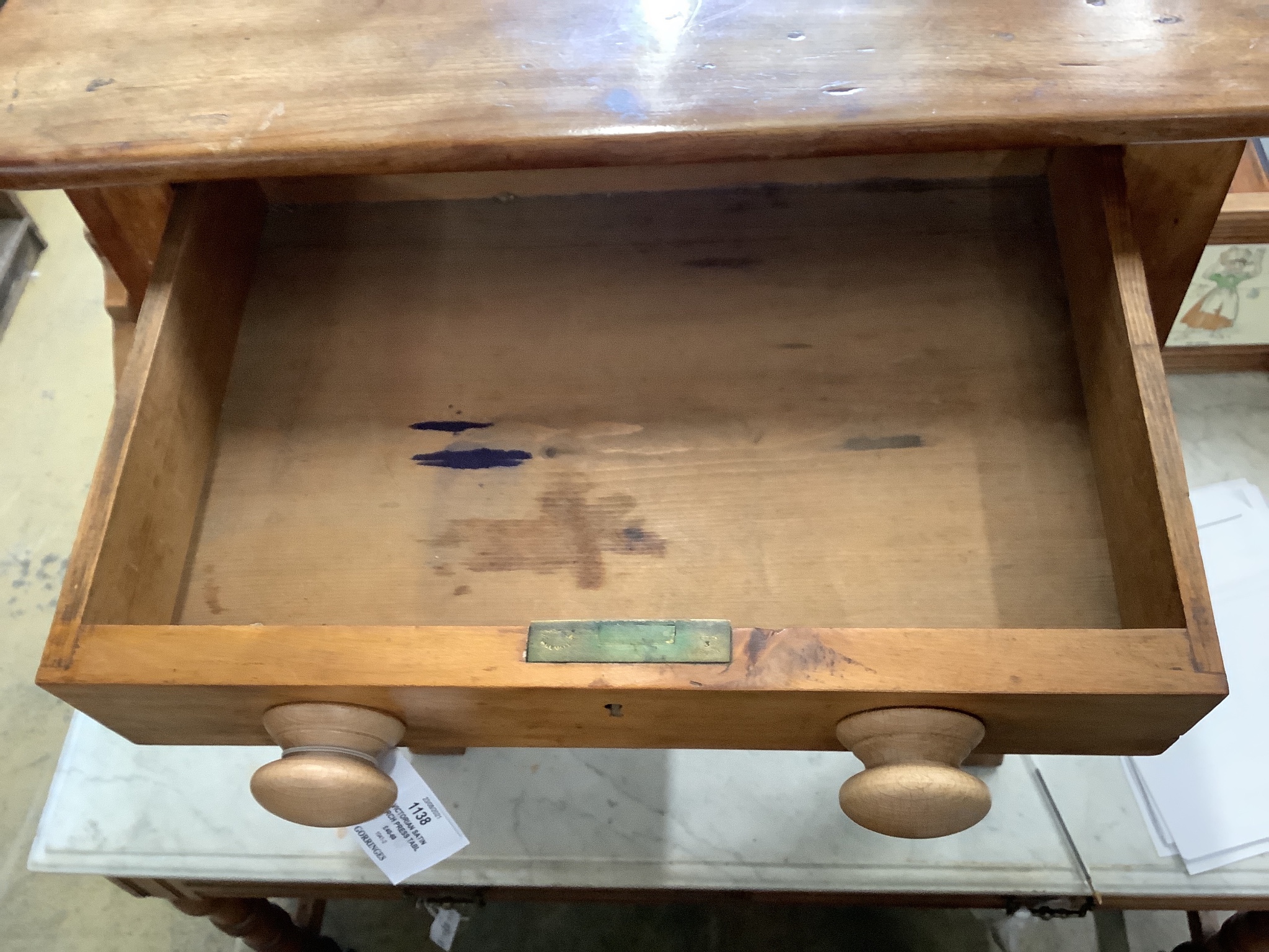 A Victorian satin Burch press table. W-58, D-40,H-68cm.